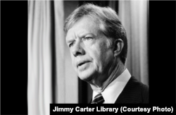 FILE - Jimmy Carter, the U.S. president from 1977 to 1981, fired four of his Cabinet secretaries to try to show "that he was changing the terms of his administration," presidential historian Michael Beschloss says.