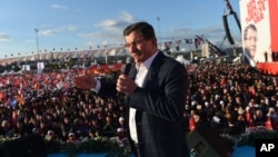 Turkish Prime Minister Ahmet Davutoglu and leader of the Justice and Development Party (AKP), delivers his speech at a rally in Istanbul, Oct. 25, 2015, ahead of the Nov. 1 general elections.