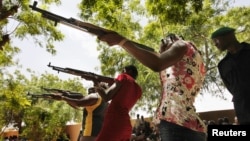 Women members of a self-defense militia calling itself the FLN [Front for the Liberation of the North] train in Sevare, about 600 kilometers northeast of the capital Bamako, Mali, July 11, 2012. 