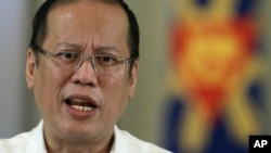 Philippine President Benigno Aquino III delivers a speech on national television at the Malacanang Presidential Palace in Manila, Philippines on Oct. 7, 2012 file photo.
