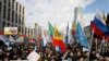 People attend a rally to protest against tightening state control over internet in Moscow, March 10, 2019. 