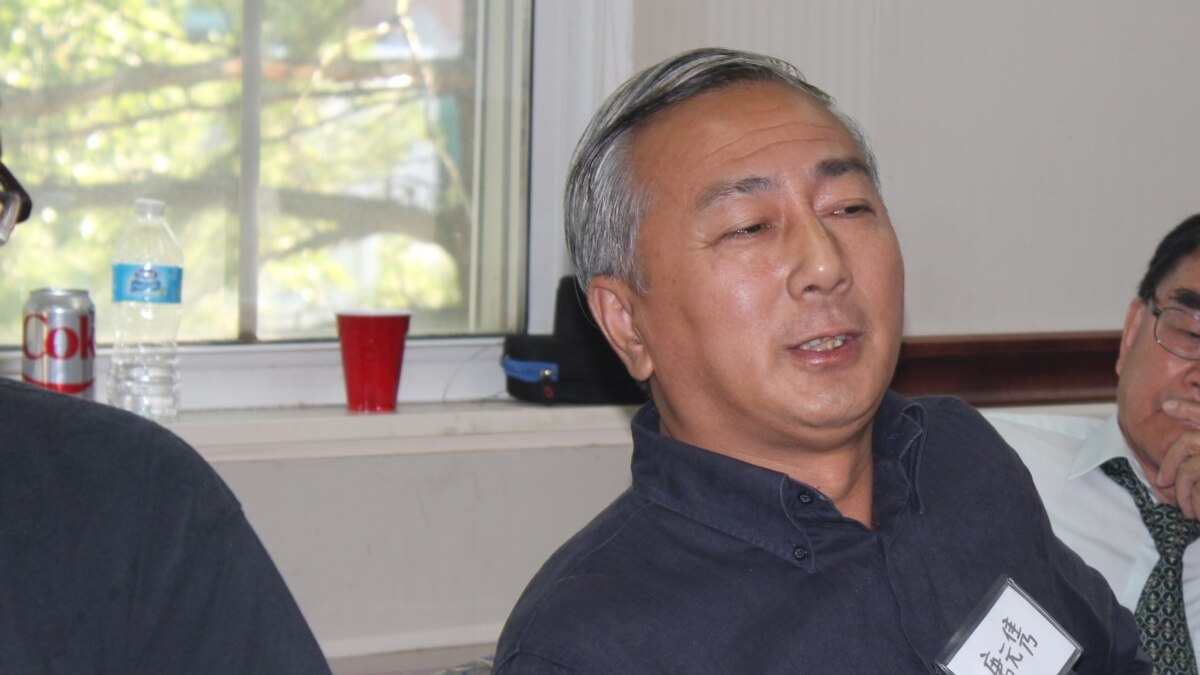 以民运人士身份活动的纽约居民唐元隽被美司法部指控为北京监视中国异议人士