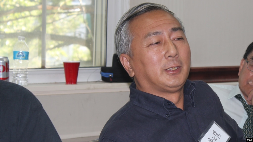 资料照片：时任民运团体民主中国阵线副主席的唐元隽在纽约参加一次讨论中国政局的研讨会。 (2015年9月19日)。