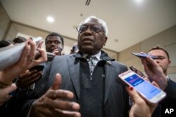 FILE - Rep. Jim Clyburn, D-S.C., arrives at the Capitol in Washington, Nov. 28, 2018.