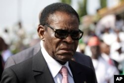 FILE - Equatorial Guinea President Teodoro Obiang Nguema Mbasogo arrives for the inauguration of the new Nigerian President, Muhammadu Buhari, in Abuja , Nigeria, Friday, May 29, 2015.