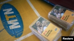FILE - An MTN starter kit pack is seen on display on a table at a retail stand in Abuja, Nigeria, Nov. 17, 2015.