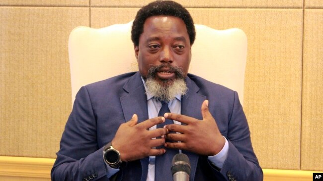 Democratic Republic of Congo's President Joseph Kabila speaks during an interview by the Associated Press at the Nation's Palace in Kinshasa, Dec. 9, 2018.