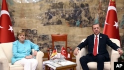 Angela Merkel et Recep Tayyip Erdogan en Chine, le 4 septembre 2016, en marge d'un sommet du G-20 à Hangzhou. 