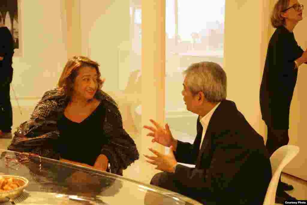 Zaha Hadid talks with Youk Chhang, director of DC-Cam, at the launched design for the Sleuk Rith Institute at her gallery in London, England, on Thursday 9th October, 2014. (Photo by Nhean Socheat/The Sleuk Rith Institute/DC-Cam)