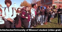University of Missouri student protesters, led by a group called Concerned Student 1950 -- a reference to the year the university first admitted black students -- block access to Mel Carnahan quad on the campus in Columbia, Missouri, Nov. 9, 2015.