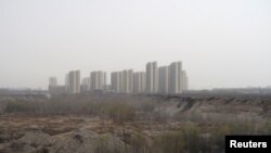 中國河北涿州由華夏幸福基業股份有限公司開發的一處住宅區建築工地。 （2021年3月19日）