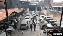 فسادات کے بعد نئی دہلی میں راکھ ہی راکھ