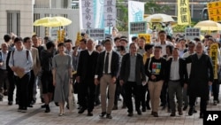 佔中九子2019年4月9日抵達香港西九龍裁判法院。 (右起)邵家臻、李永達、黃浩銘、戴耀廷、陳建民、朱耀明、陳淑莊、鍾耀華以及張秀賢。