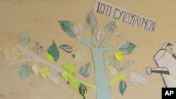 Children at AIDS camps in Rwanda are encouraged to draw a tree of hope with their life goals (file photo)