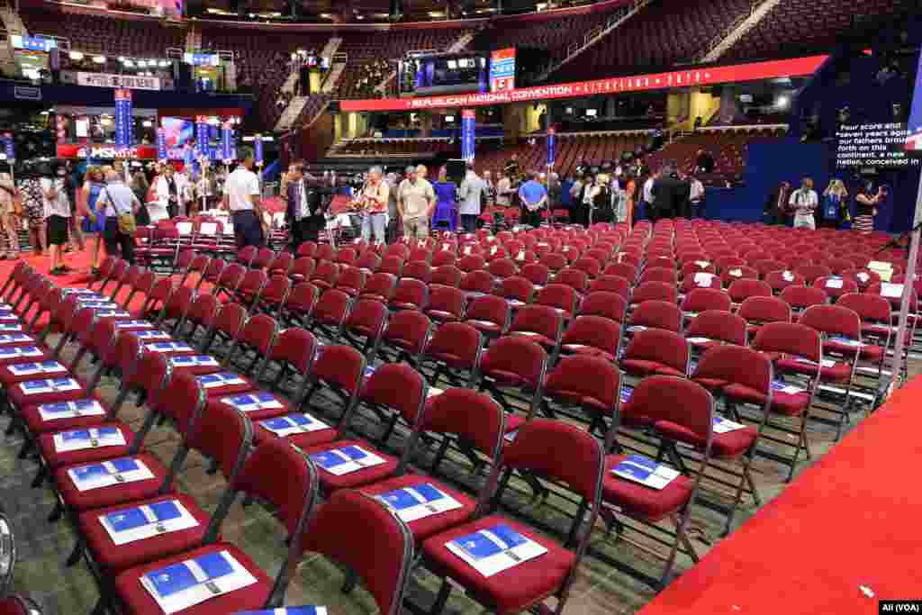 Programs are placed on delegates' chairs on the second day of the Republican National Convention, being held in Quicken Loans Arena, in Cleveland, July 19, 2016.