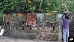 In the southern town of Jacmel, Haiti its all about art. Last year’s earthquake changed the way Jacmel’s artists view their craft