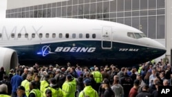 A Boeing 737 MAX 7, the newest version of Boeing's fastest-selling airplane, is displayed during a debut for employees and media of the new jet Feb. 5, 2018, in Renton, Wash. 
