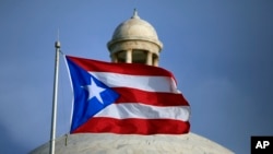 Puerto Rico sigue sumergido en una terrible deuda en busca de negociaciones.