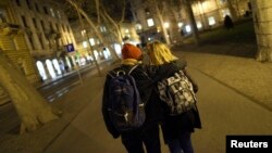 Same-sex couple Mima Simic and Marta Sisak walk in Zagreb, Croatia, Nov. 26, 2013. 