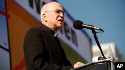 FILE - Archbishop Carlo Maria Vigano speaks to thousands during the "Walk for Life" rally and march in San Francisco, Jan. 24, 2015. 