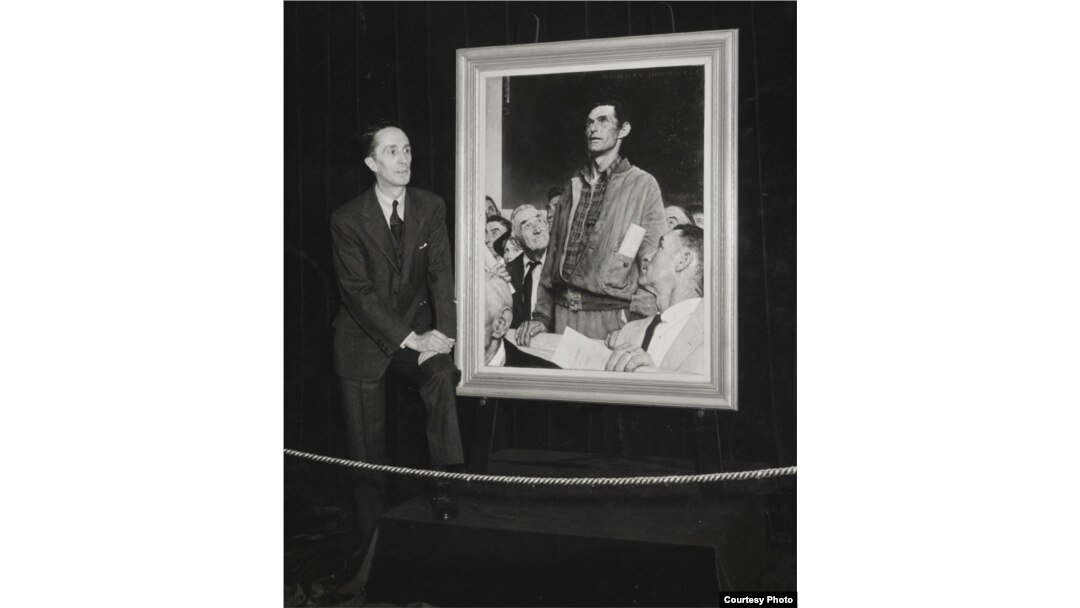 Norman Rockwell standing in front of his painting Freedom of Speech at Hecht’s Department Store, Washington, DC, inaugural stop of the Four Freedoms War Bond Tour, 1943. (Norman Rockwell Museum Collection)