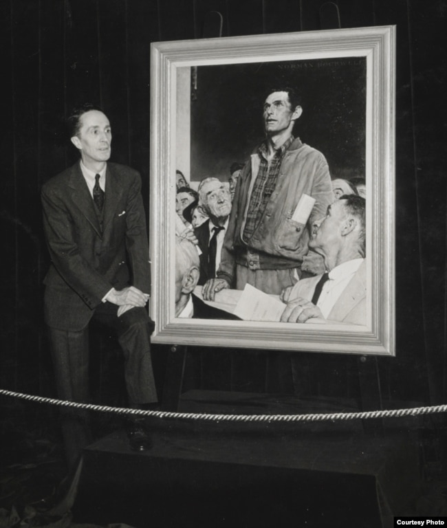 Norman Rockwell standing in front of his painting Freedom of Speech at Hecht’s Department Store, Washington, DC, inaugural stop of the Four Freedoms War Bond Tour, 1943. (Norman Rockwell Museum Collection)