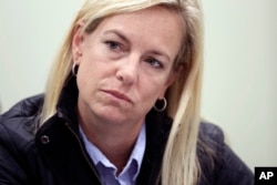 FILE - Homeland Secretary Kirstjen Nielsen listens during an interview, Jan. 2, 2018, in San Diego.