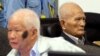 In this photo released by the Extraordinary Chambers in the Courts of Cambodia, Khieu Samphan, left, former Khmer Rouge head of state, and Nuon Chea, right, who was the Khmer Rouge's chief ideologist and No. 2 leader, sit in the court hall before they made closing statements at the U.N.-backed war crimes tribunal in Phnom Penh, file photo. 
