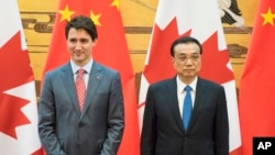 쥐스탱 트뤼도 캐나다 총리와 리커창 중국 총리.