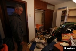 Personal belongings are seen on the floor at the residence of Roberto Marrero, chief of staff to opposition leader Juan Guaido, after he was detained by Venezuelan intelligence agents, according to legislators, in Caracas, Venezuela, March 21, 2019.