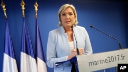 France 2016 US Election: French far-right leader Marine le Pen makes a statement on the presidential election in the United States of America, Wednesday Nov. 9, 2016 in Nanterre, outside Paris. A French outsider with an anti-system agenda, far-right leade