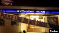 Police tape is seen at a crime scene at Leytonstone underground station in east London, Britain Dec. 6, 2015. Police were called to reports of a number of people stabbed at the station in east London and a man threatening other people with a knife.