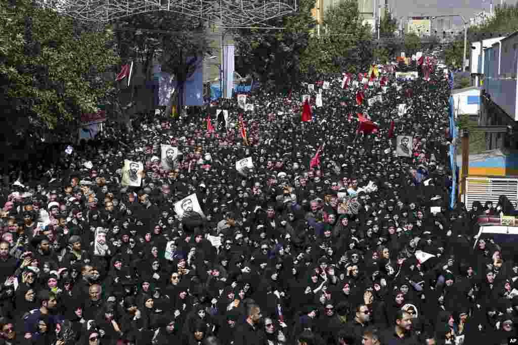 Thousands of Iranians attend the state funeral of Mohsen Hojaji, a young Revolutionary Guard soldier beheaded by the Islamic State group in Syria, in Tehran, Iran.