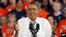 President Barack Obama shrugs during a rally in Charlottesville, Virginia, Aug. 29, 2012. 