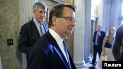 U.S. Senator Gary Peters, a Michigan Democrat, speaks with reporters at the U.S. Capitol after confirming his support for the international nuclear deal with Iran, Sept. 8, 2015.