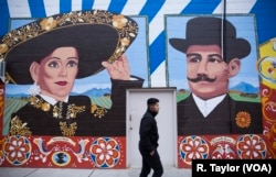 An East Boston mural celebrates Mexican-born activist Veronica Robles and Sicilian entrepreneur Carmello Scire, both immigrants to Boston. The artwork is part of the City of Boston's "To Immigrants With Love" project, which celebrates Boston’s immigrants, old and new.