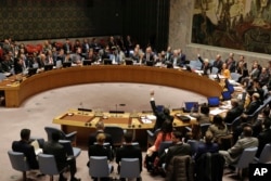 FILE - The U.N. Security Council votes on a resolution concerning North Korea, March 23, 2017. The council on April 6 condemned Pyongyang for its latest missile test.