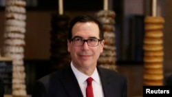 U.S. Treasury Secretary Steven Mnuchin, a member of the U.S. trade delegation to China, returns to a hotel in Beijing, China May 3, 2018. REUTERS