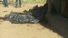 This photo, taken on or about April 12, 2017, shows the remains of a man slain during a raid on the town of Parjok, South Sudan, by men wearing uniforms of the South Sudanese army. Up to 16 people were killed, many of them execution-style.