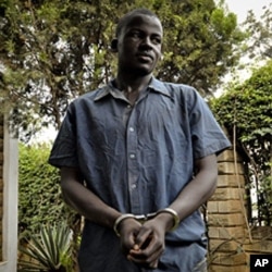 Enoch Nsubuga, killer of gay rights activist David Kato, standing in front of journalists at the Ugandan media center in Kampala, February 3, 2011 (file).