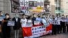 被控非法组织香港六四烛光晚会的13人出庭应讯