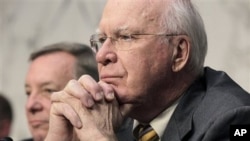 Senate Judiciary Committee Chairman Sen. Patrick Leahy, D-Vt., right, listens to testimony on Capitol Hill in Washington, during the committee's hearing examining the validity of the national health care law under the Constitution, February 02, 2011.