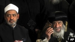 Ahmed el-Tayeb, the grand sheik of Cairo's Al-Azhar, the pre-eminent theological institute of Sunni Islam, left, and Pope Shenouda III, the head of the Coptic Church, talk to the media in Cairo, Egypt, 02 Jan 2011