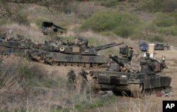 U.S. Army M1A2 tanks conduct a military exercise in Paju, near the border with North Korea, South Korea, April 21, 2017.