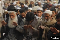 People attend special prayers for rain in Peshawar, Pakistan, Dec. 30, 2016. Lack of winter rains in the country has caused problems for farmers.