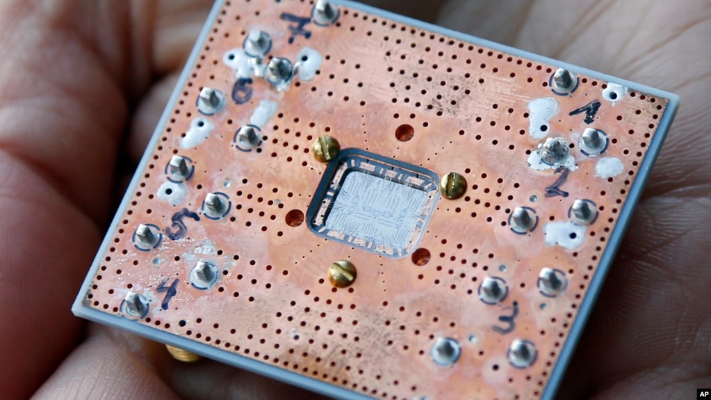 FILE - A quantum computing part seen at the IBM Thomas J. Watson Research Center in Yorktown Heights, N.Y. seen on February 27, 2018. (AP Photo/Seth Wenig)