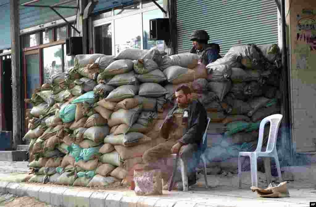 Syrian security tries to quash dissent in Douma, but residents remain defiant, Jan. 14, 2012. (E. Arrott/VOA)