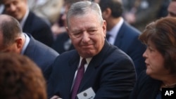 Qatar hires former Bush administration Attorney General John Ashcroft's law firm for $2.5 million to audit its efforts at stopping terrorism funding. 