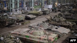 A General view taken on March 12, 2015 shows a tank repair workshop in the rebel stronghold of Donetsk. 