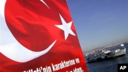 A ferry sail in the Bosporus transports people from Istanbul's Asian side to the European side, Turkey, November 2011.